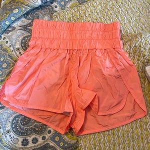 Coral colored free people movement “the way home” shorts
